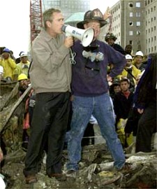 Bush with firefighter.